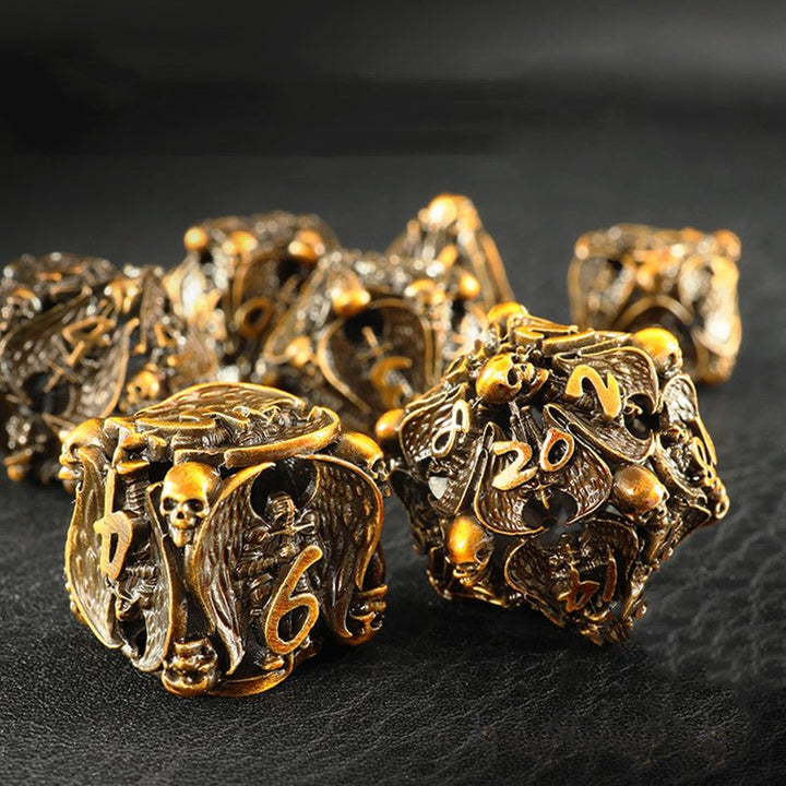 DnD Hollow Metal Brass Skulls & Knights 7pc Dice Set - Madee's Boutique Dice Accessories Madee's Boutique aluminum dnd dice aruohha
