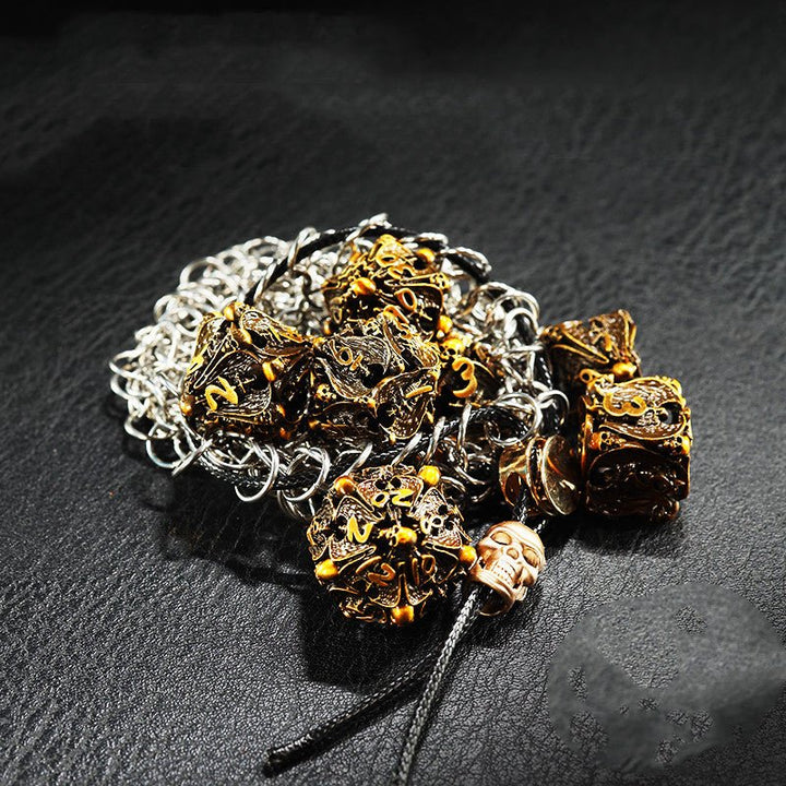 DnD Hollow Metal Brass Skulls & Knights 7pc Dice Set - Madee's Boutique Dice Accessories Madee's Boutique aluminum dnd dice aruohha